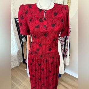 Red and Black Patterned Garment